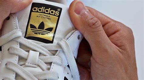 como saber si son originales las adidas rusti|ver si adidas es real.